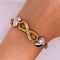 Pulsera Oro 10k, con Infinito y Corazones, Largo 19 cm, Ancho 12 mm, Oro Combinado 10k