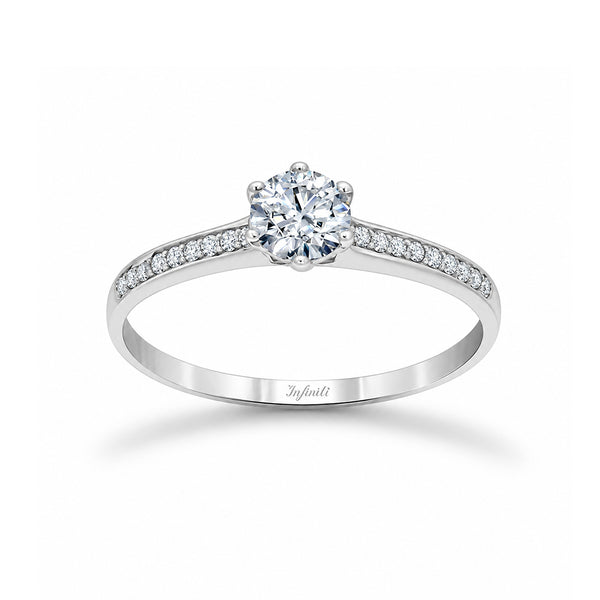 Anillo Oro Blanco 10k, con Zirconias de 5 mm