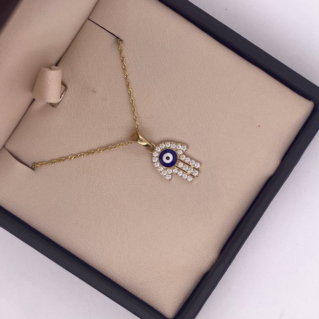 Dije Oro 10k - Mano de Fátima con Zirconias y Ojo Turco