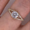 Anillo Oro 10k - Zirconia Central de 5.5 mm con Laterales