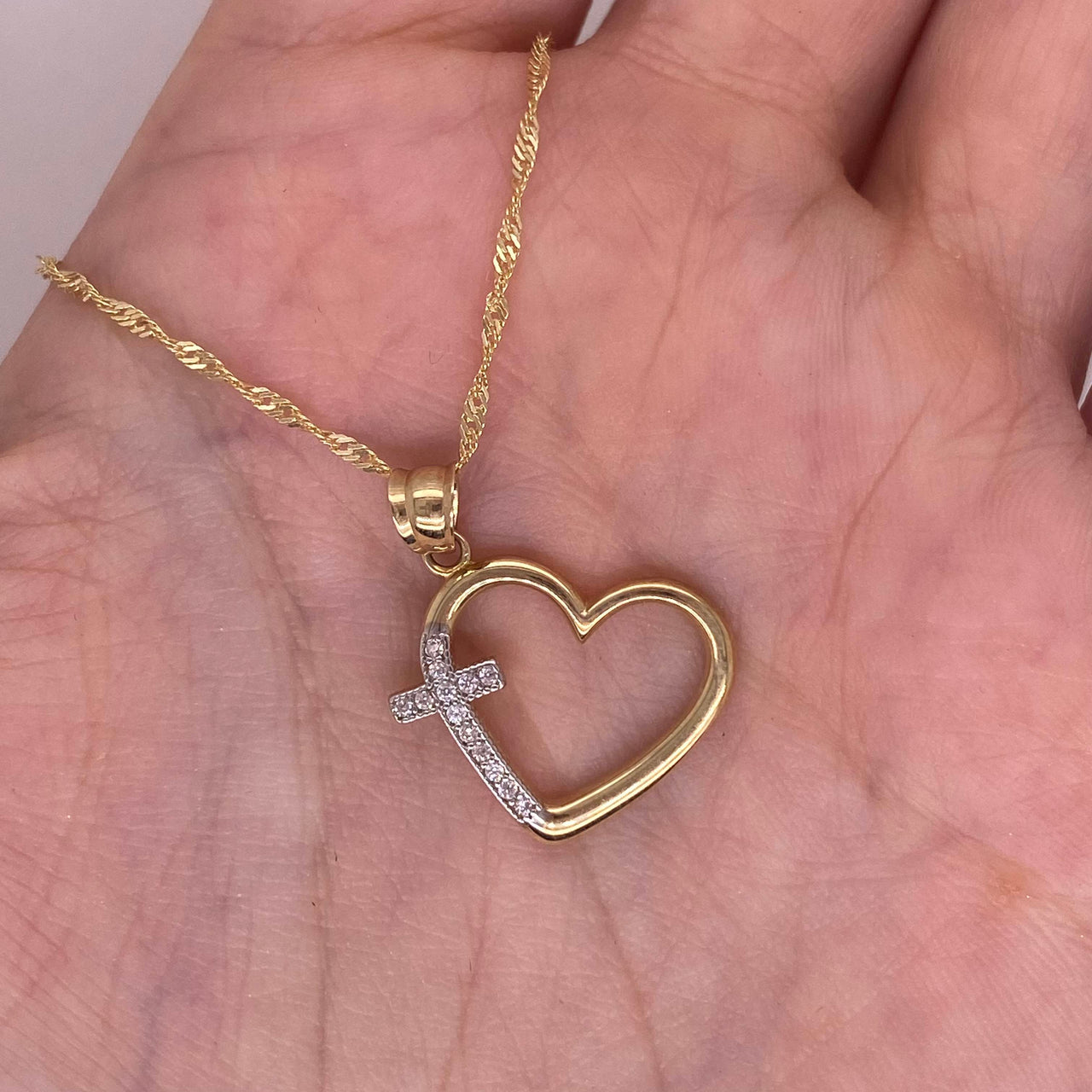 Dije Oro 10k - Corazón con Cruz con Zirconias