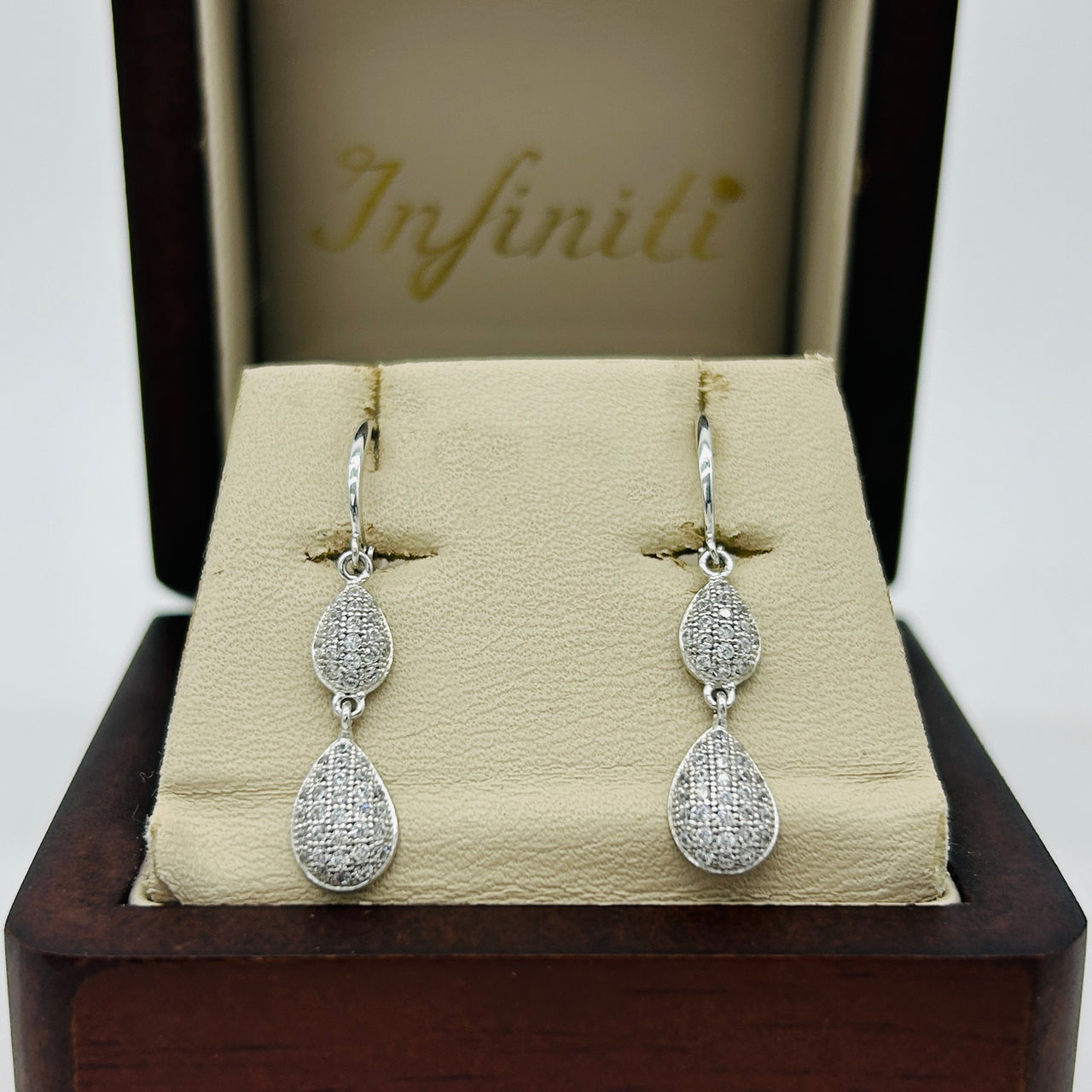 Arete Oro Blanco 10k - Gotas Colgantes con Zirconias