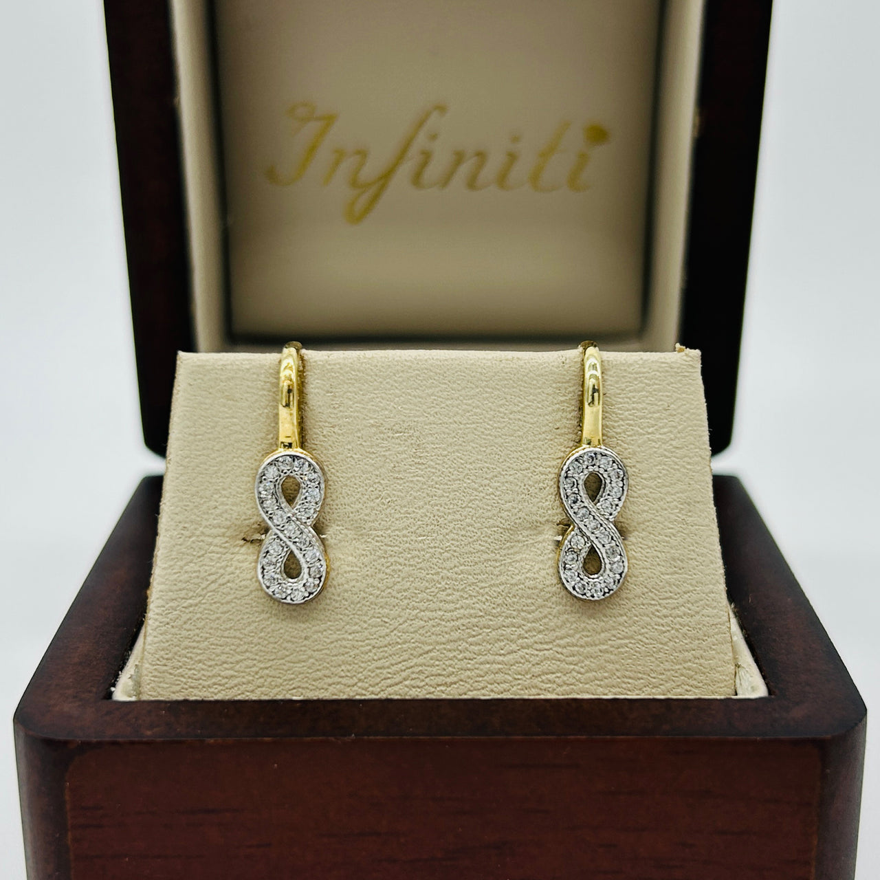 Arete Oro 10k - Infinito con Zirconias