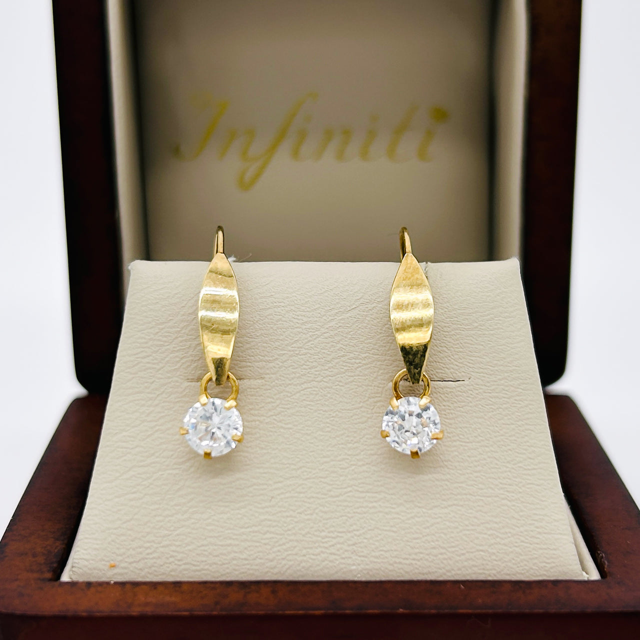 Aretes Oro 10k - Hoja con Zirconia