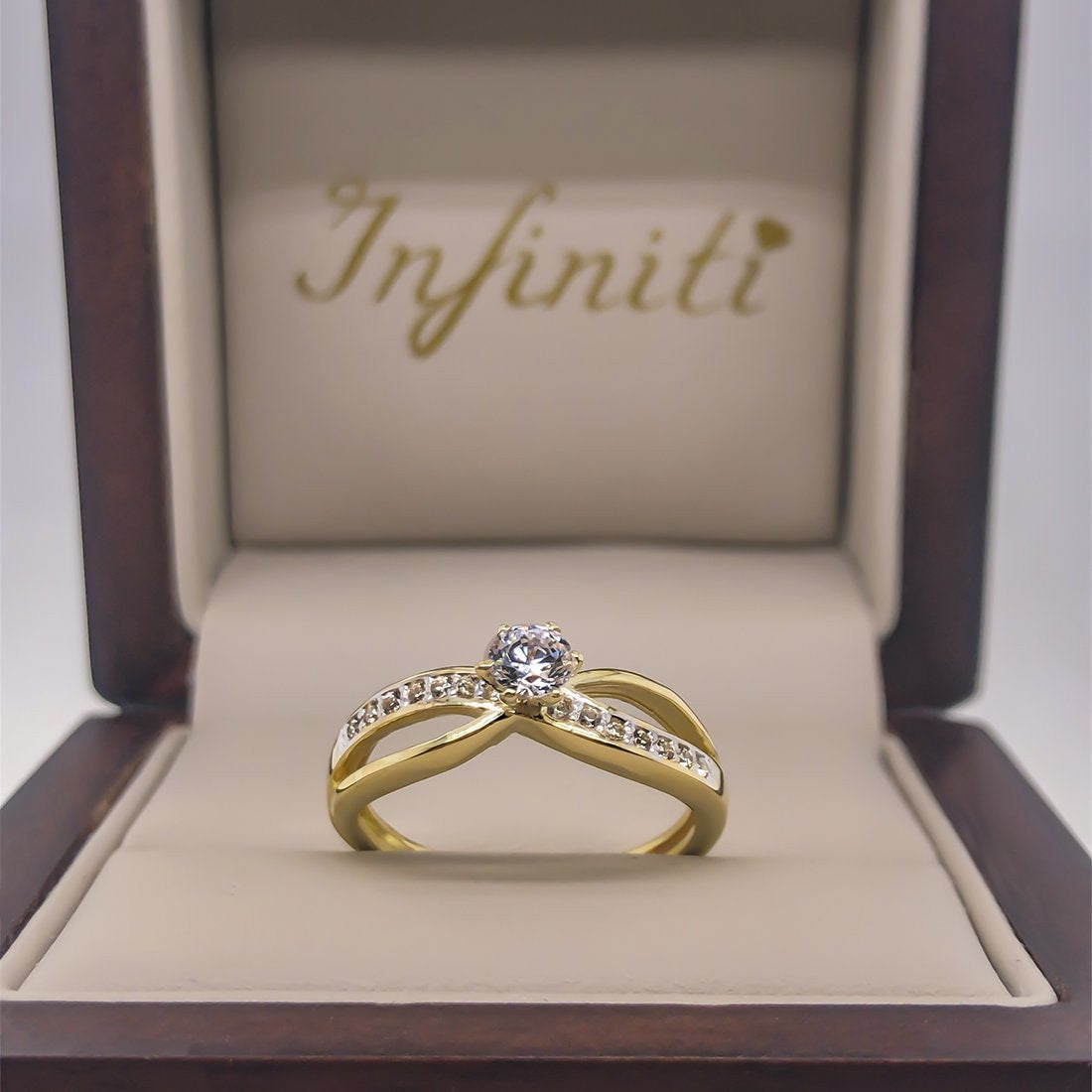 Anillo Oro 10k, Estilo Infinito Zirconia Central 4 mm - Infiniti Joyas