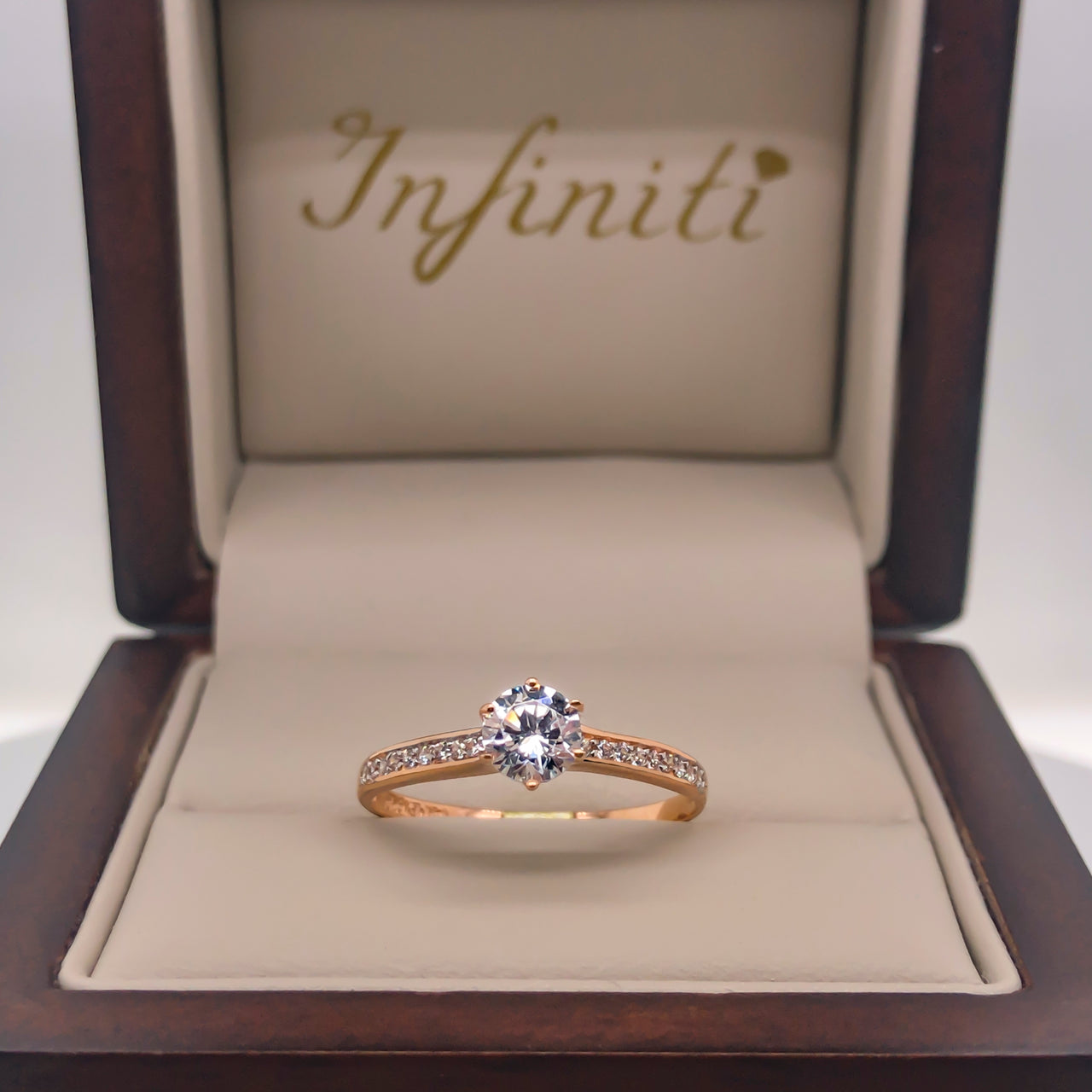 Anillo Oro Rosa 14k - Estilo Pavé Zirconia Central 5 mm