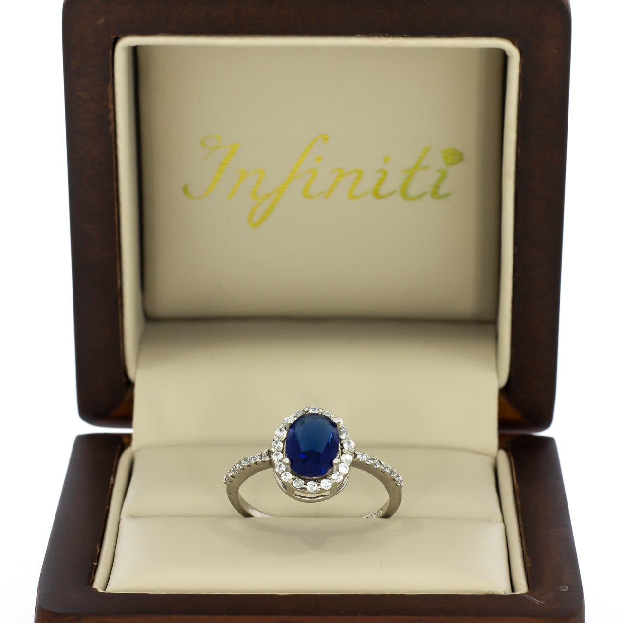 Anillo Oro Blanco 10k - Halo Zafiro con Zirconias