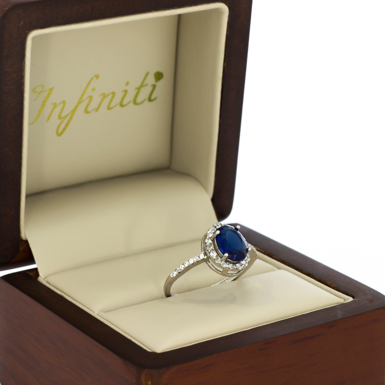 Anillo Oro Blanco 10k - Halo Zafiro con Zirconias