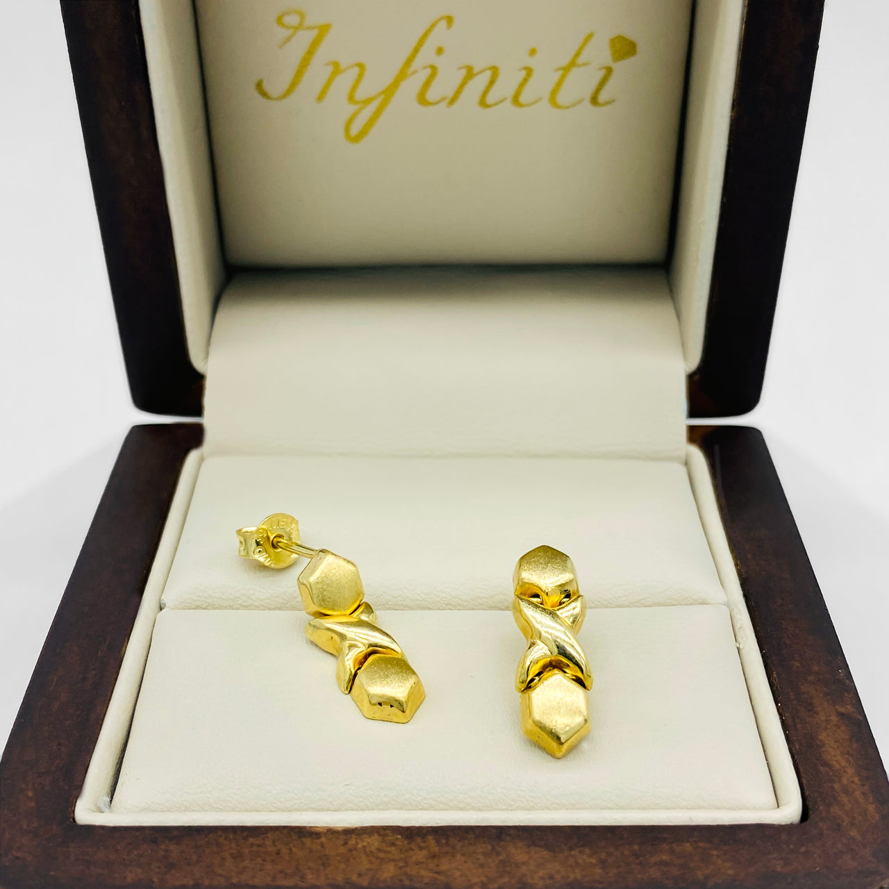 Broquel X O, Oro 14k