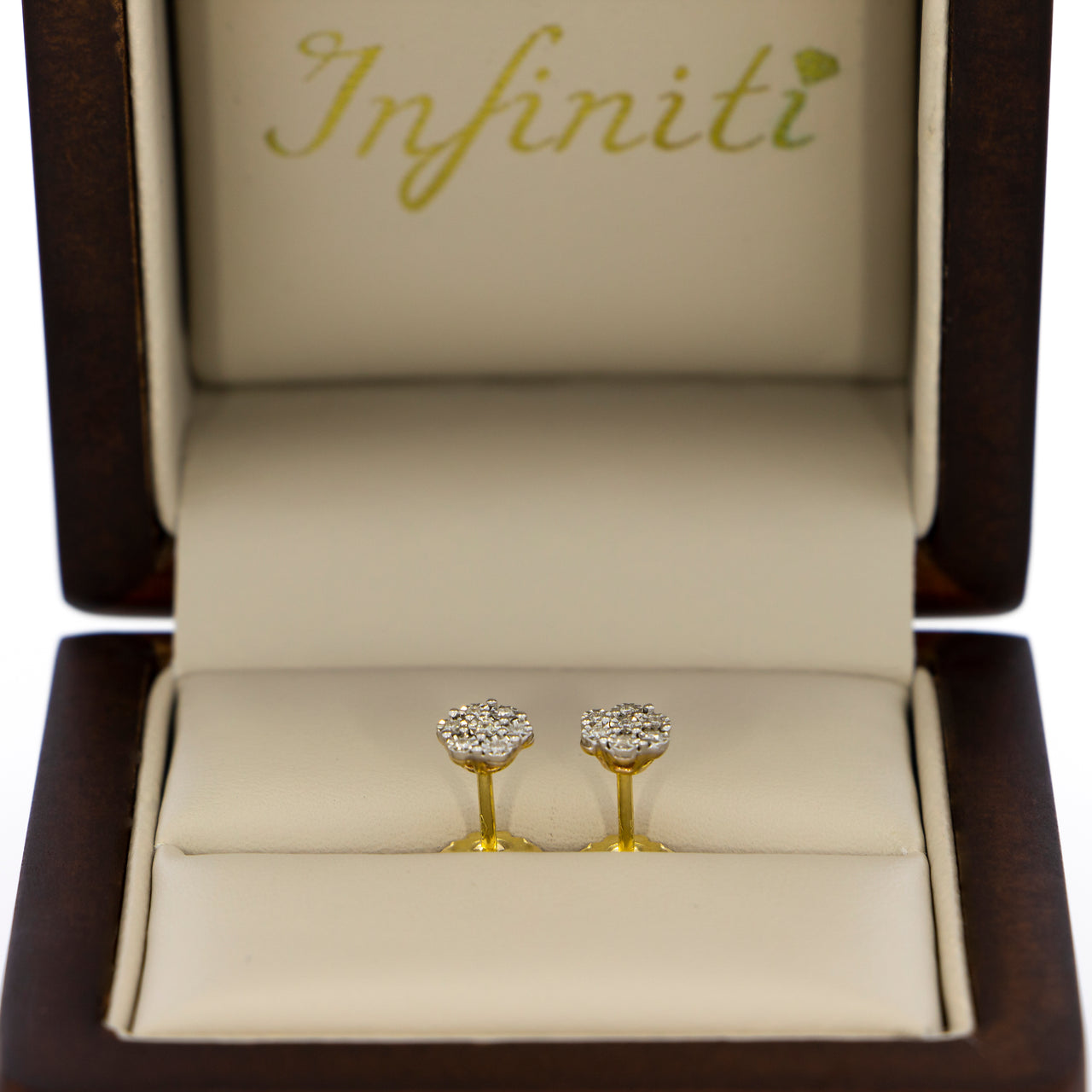Broquel Oro 14k - Flor con Diamantes con un Peso Total de 6 Puntos