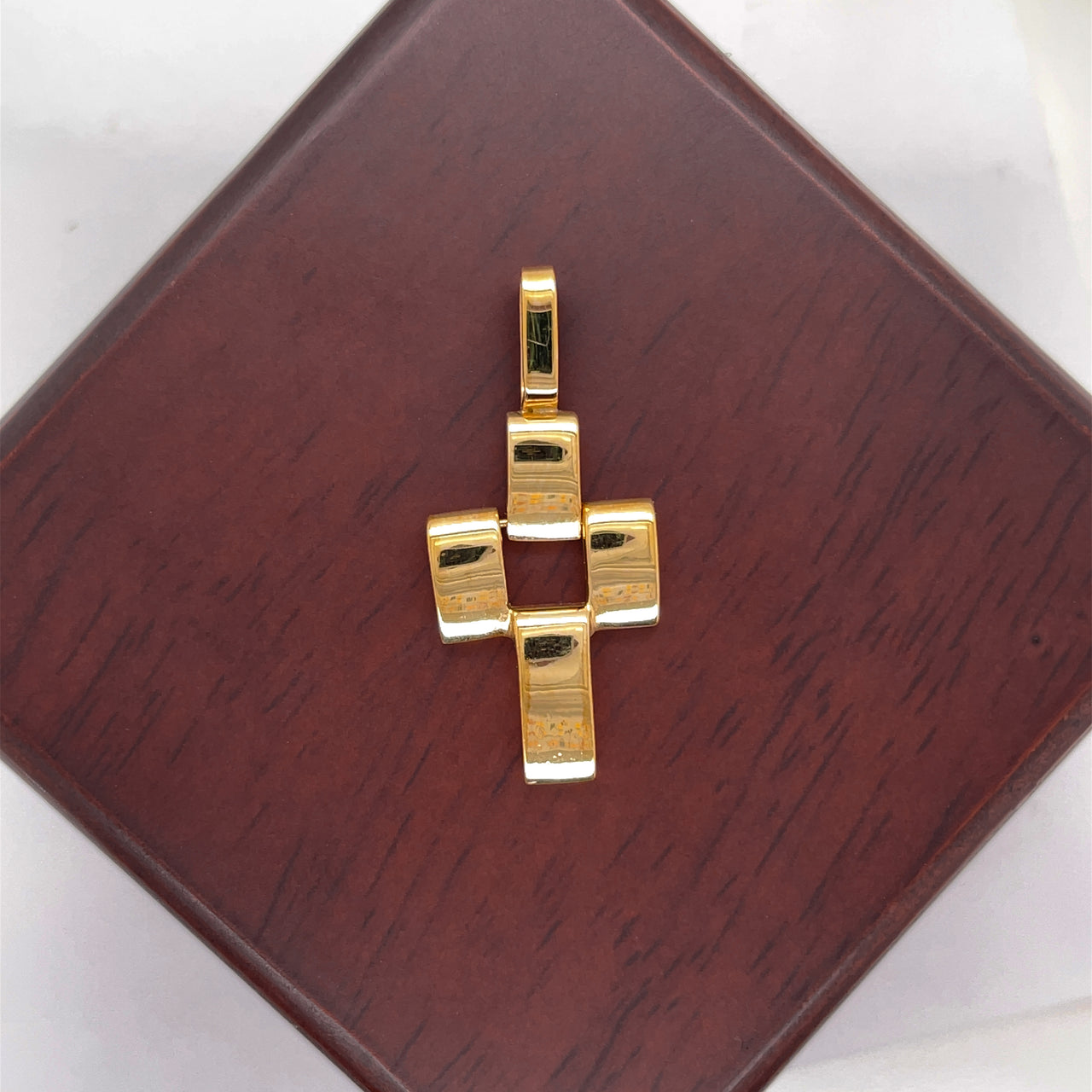 Dije Cruz movible 3 cm alto, Largo 1.3 cm, Oro 10k