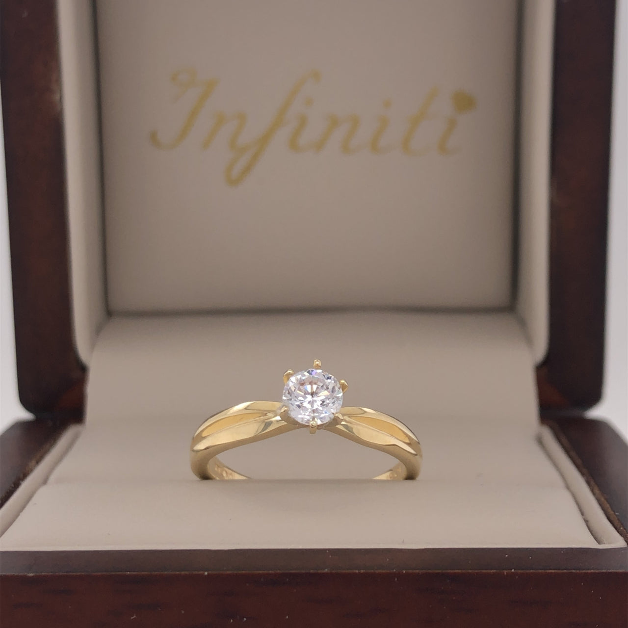 Anillo Oro 10k, Estilo Apertura Central, Zirconia de 4.5 mm - Infiniti Joyas