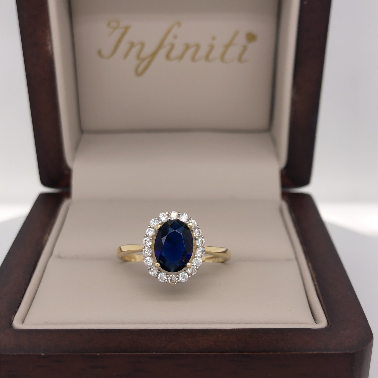 Anillo Oro 10k, Halo con Zafiro 8x6 mm - Infiniti Joyas
